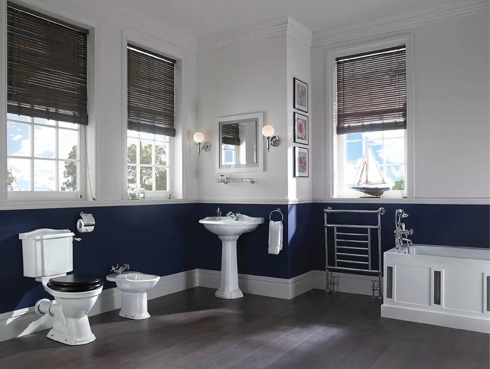  blue wallpaper and victorian style mirror