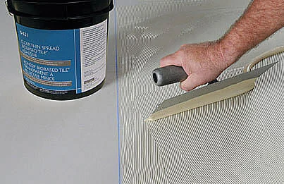 Floor-covering adhesive