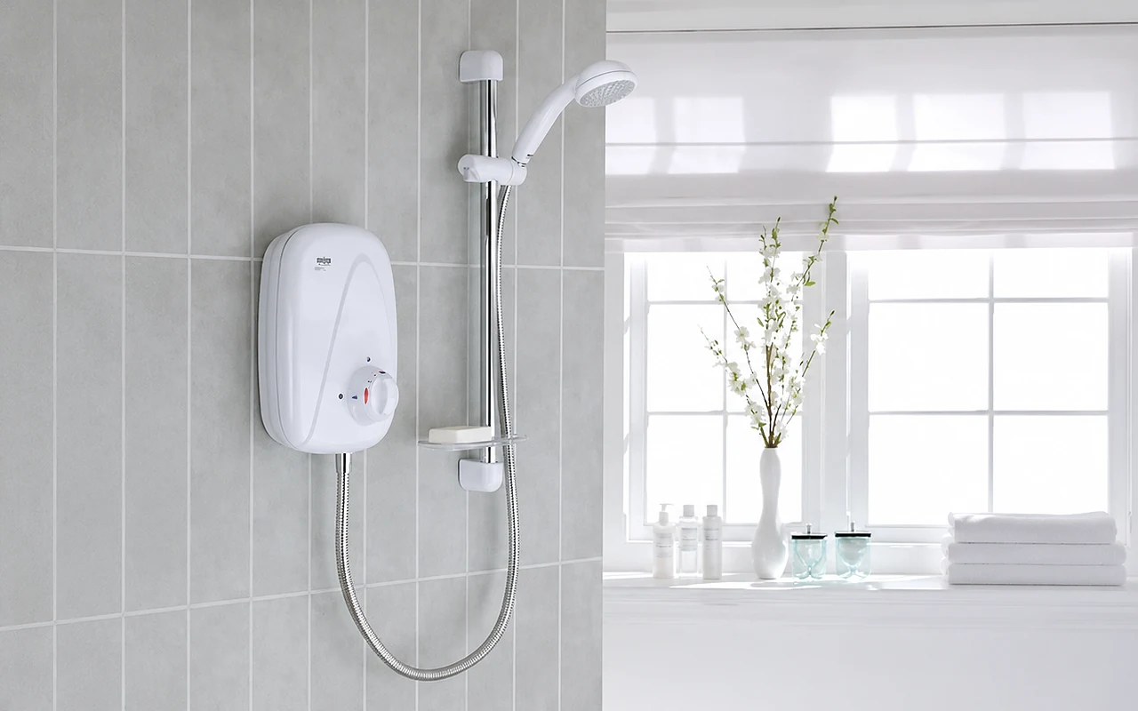 Mira Vigour electric shower unit mounted on a tiled bathroom wall with sliding rail and handheld showerhead.